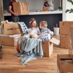 Children Near Boxes Relocating With Parents