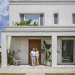 Arizona Couple In Front Of House Owned Jointly
