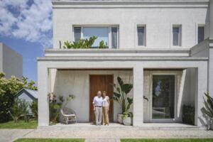 Arizona Couple In Front Of House Owned Jointly
